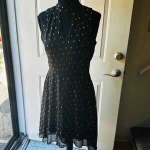 White House Black Market Midi Dress black with gold print touches. Size 4.